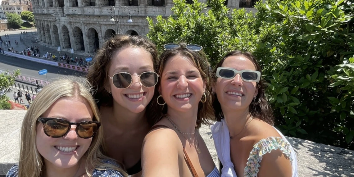 Italian students in front of the Colliseum in Rome