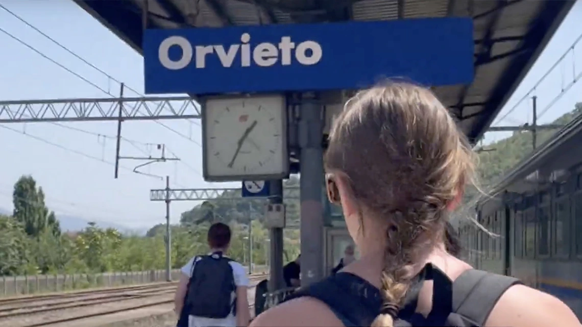 Student walking on Orvieto train platform