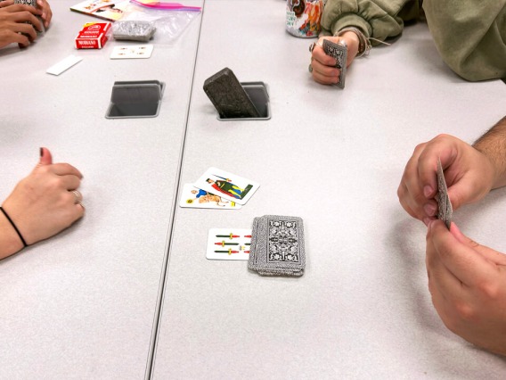 students playing a card game