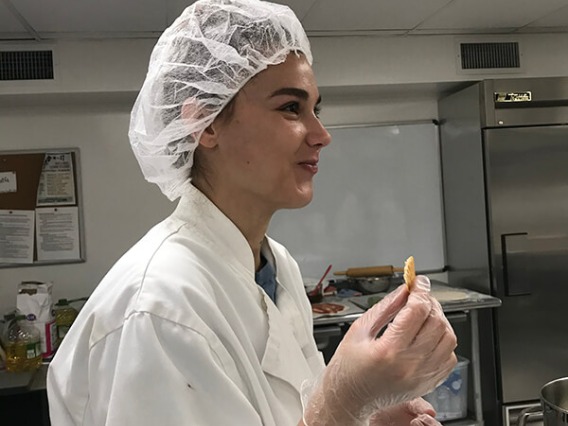 Italian student sampling homemade food