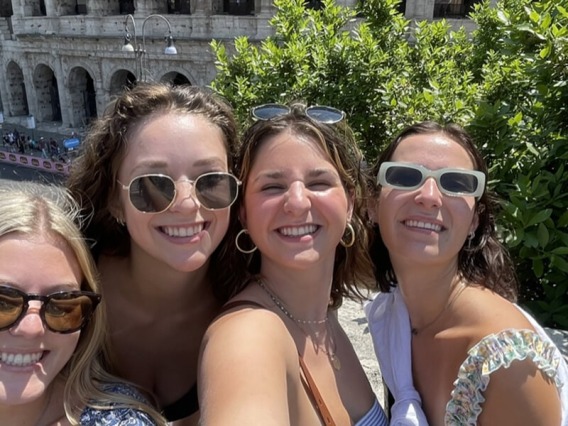 Italian students in front of the Colliseum in Rome