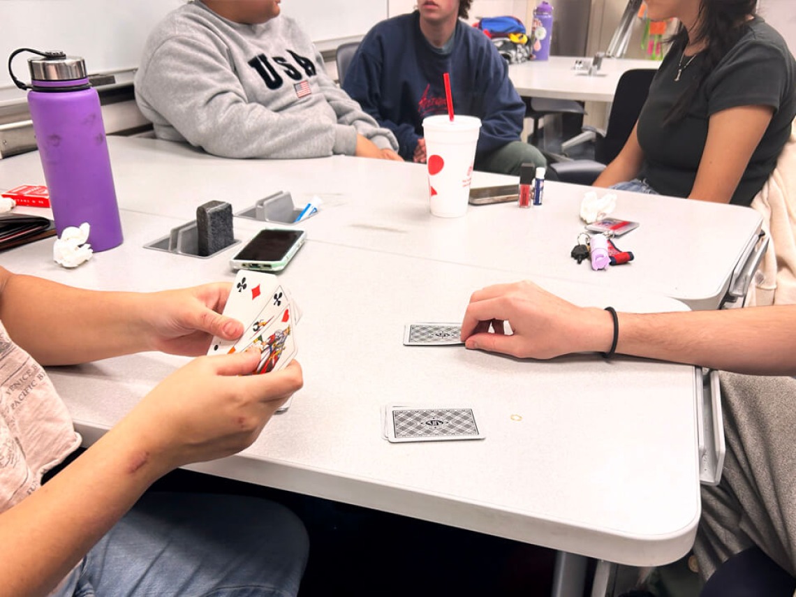 students playing a card game